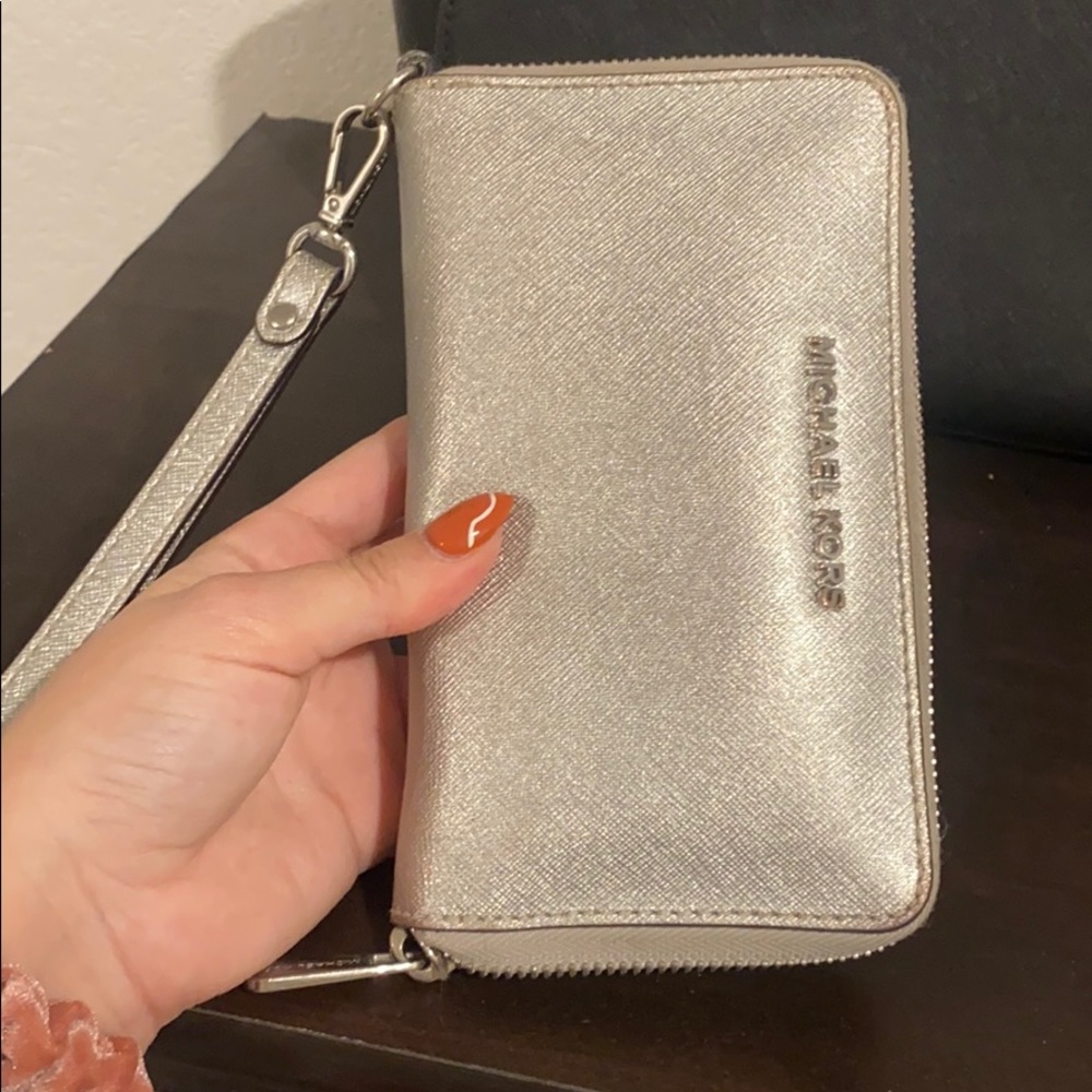 Silver Michael Kors wallet with phone pocket